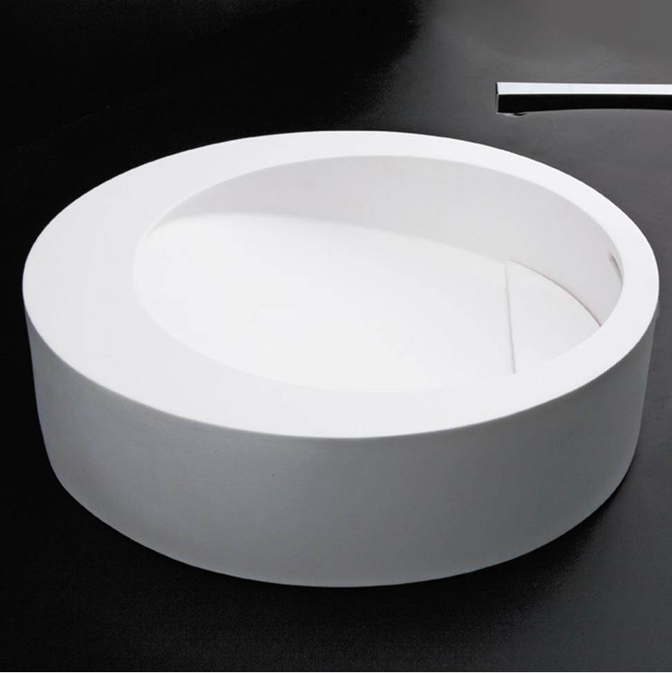 Fixtures, Etc.LacavaRound solid surface vessel washbasin with overflow and decorative drain cover (drain not included), finished back. 17 3/4''DIAM x 5 1/2''H