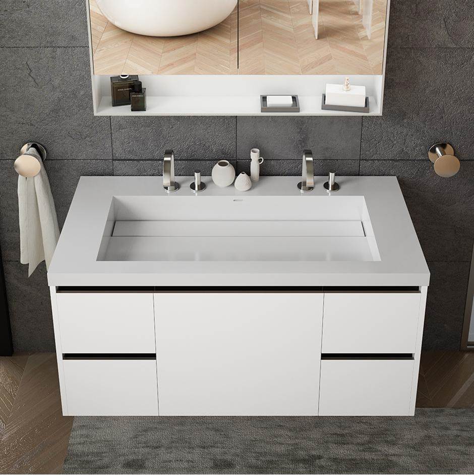 Fixtures, Etc.LacavaVanity-top wide center-bowl Bathroom Sink made of solid surface, with an overflow and decorative drain cover.